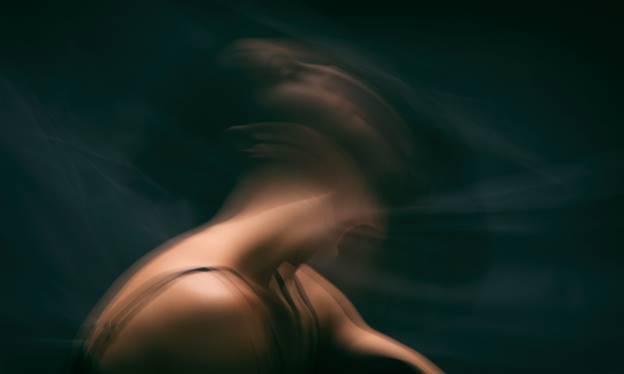 Blurred image of a person, likely expressing distress. The page discusses federal protections available for victims of revenge porn.